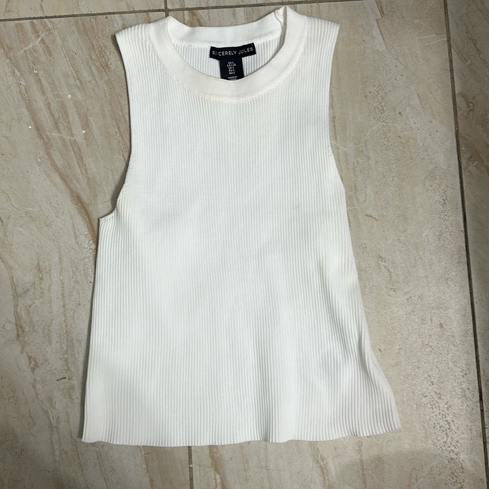 White sleeveless top